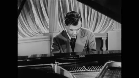 USA - 1946 - Robert Crum concludes "Adventure in Boogie Woogie" on the piano. Stock Footage 254155842