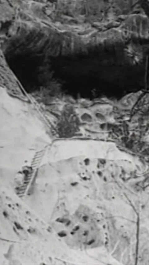 USA - 1949 - Native Americans pose with drums and feathers, and climb a Stock Footage 339103640