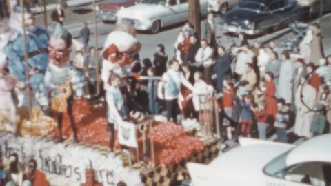 USA - 1950s: 50s car pulls a float during a parade in small town Stock Footage 258215650