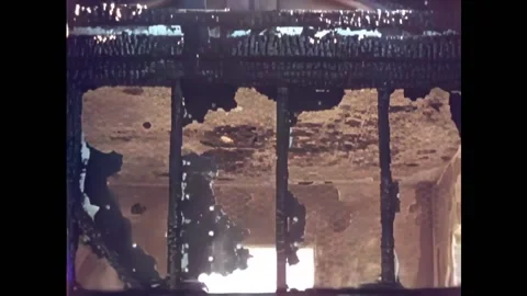 USA - 1950s - Burnt framing of different structures are shown from a fire test. Stock Footage 327747990