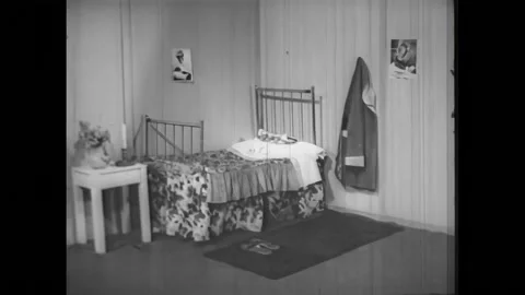 USA - 1950s - A chimp gestures from a window that hides under a bed. People and Stock Footage 327735498