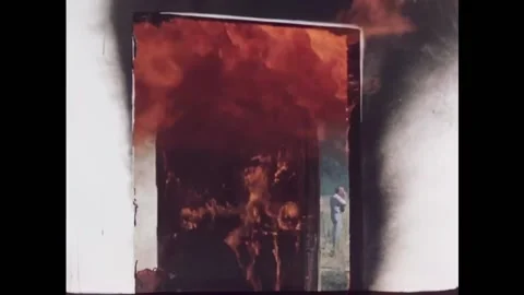 USA - 1950s - Fire billows out of a window. Officers and other people watched Stock Footage 327743360