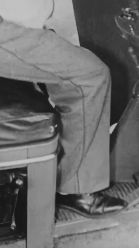 USA - 1950s - A mailster driver demonstrates how to start the engine with an Stock Footage 340296978
