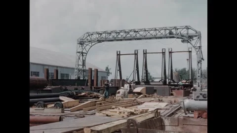 USA - 1950s - Welders work on a dam's construction site. Stock Footage 340665705