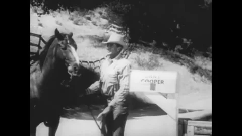 USA - 1951 - In this PSA, Gary Cooper rides his horse to his mailbox to collect Stock Footage 340577230