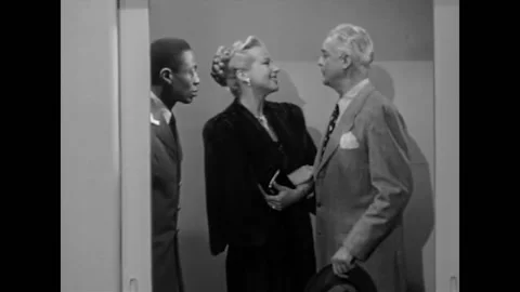 USA - 1952 - In this comedy, a man and woman exit an elevator car. They speak Stock-Footage 327751682
