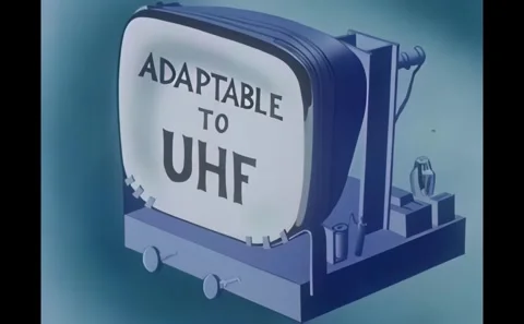 USA - 1952 - A woman adjusts the knobs and dials on her television set. 스톡 동영상 324776579