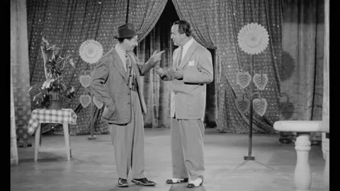 USA - 1953 - In this burlesque comedy, two men joke about a woman in trouble. Stock Footage 327681028