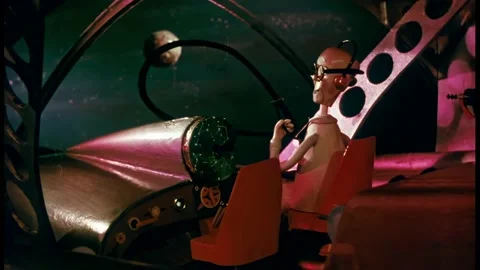 USA - 1953 - In this stop-motion animated film, a robot helps the pilot of a Stock Footage 327681327