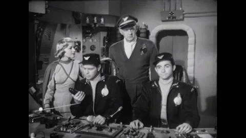USA - 1954 - In this adventure sci-fi film, men in a spaceship speak over radios Stock Footage 327738029