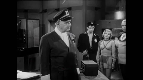 USA - 1954 - In this adventure sci-fi film, lightning strikes over spaceships. A Stock Footage 327740521