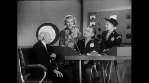 USA - 1954 - In this adventure sci-fi film, men in a spaceship speak to a group Stock Footage 327741000