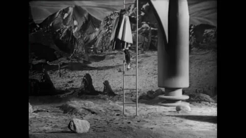 USA - 1954 - In this adventure sci-fi film, officers grab a woman descending Stock Footage 327742521