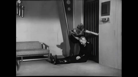 USA - 1954 - In this adventure sci-fi film, people fight in a moon planet Stock Footage 327742998