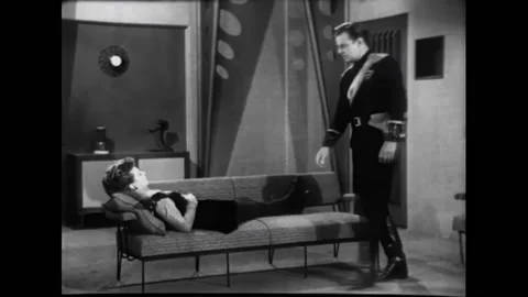 USA - 1954 - In this adventure sci-fi film, an officer enters a room with a Stock Footage 327744454