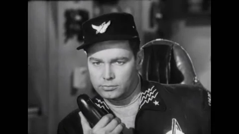 USA - 1954 - In this adventure sci-fi film, men on a spaceship speak with people Stock Footage 327745017