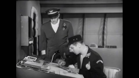 USA - 1954 - In this adventure sci-fi film, a man draws on a drafting table, Stock Footage 327745736