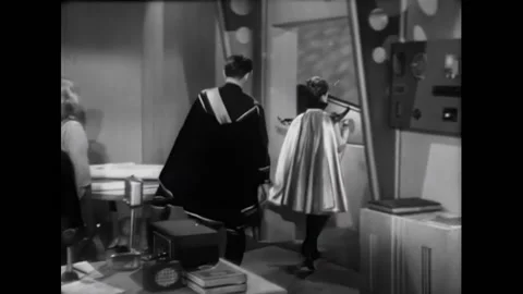 USA - 1954 - In this adventure sci-fi film, a woman makes an announcement to a Stock Footage 327752432
