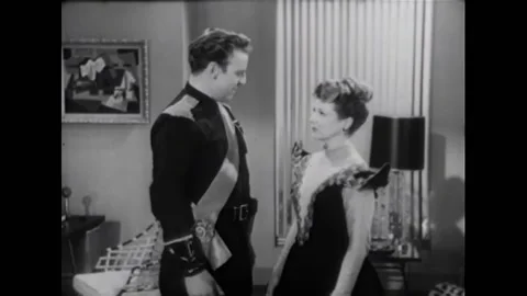 USA - 1954 - In this adventure sci-fi film, a couple speaks in a home about a Stock Footage 327752892