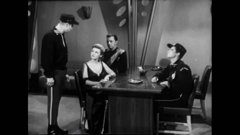 USA - 1954 - In this adventure sci-fi film, a man speaks with a woman leader of Stock Footage 327754508
