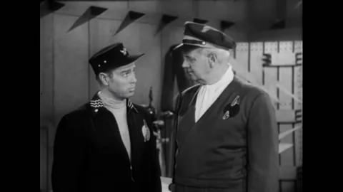 USA - 1954 - In this adventure sci-fi film, a pilot speaks with a commander and Stock Footage 327754708