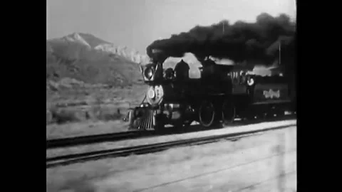 USA - 1954 - In this western, a steam engine train rides down a track. Native Видео 325210733