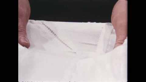 USA - 1955 - A dancer sees the difference in needle cutting between a girdle Stock Footage 330671032