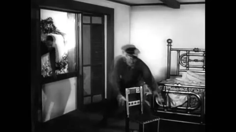 USA - 1955 - John Wayne films a fight scene before discussing how many Americans Stock Footage 288085880