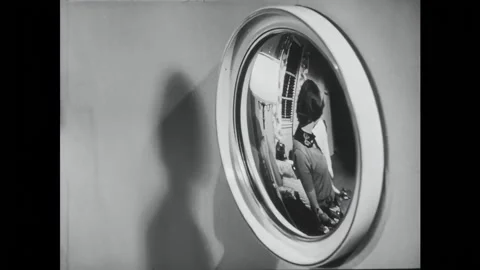 USA - 1955 - Light reflection is described with examples and a girl looks in a Stock Footage 328182812