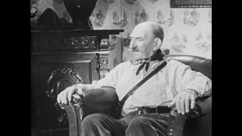 USA - 1955 - A monkey sits in a window and children start to yell. A man wakes 스톡 동영상 327737244