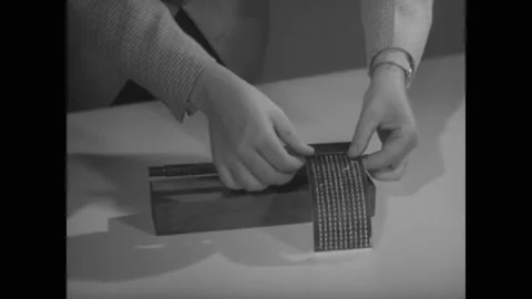 USA - 1956 - A man demonstrates the use of an early Edison invention made to Stock Footage 341993793