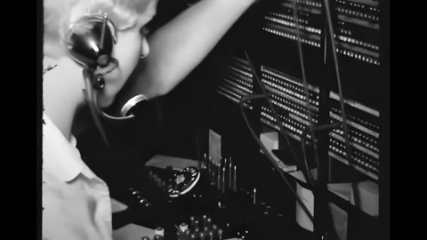 USA - 1956 - A switchboard operator handles long distance calls. Stock Footage 323264860