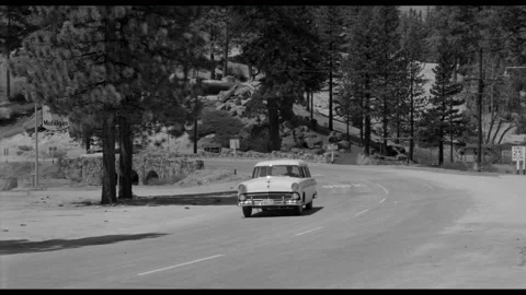 USA - 1958 - In this sci-fi horror, a car drives into a town and men speak about Video stock 323082119