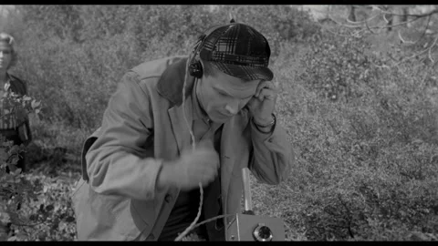 USA - 1958 - In this sci-fi horror, a man finds something with a metal detector. Stock-Footage 323082320