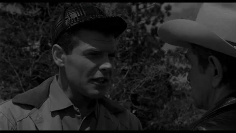 USA - 1958 - In this sci-fi horror, a sheriff speaks with a man about a dead Stockbeeldmateriaal 323082391