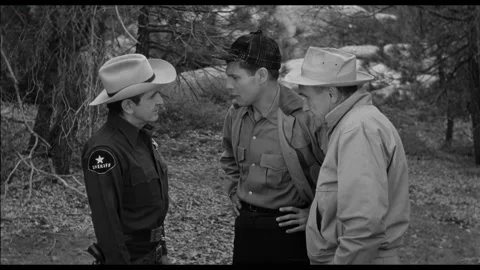 USA - 1958 - In this sci-fi horror, a policeman accosts a man. Another man Stock-Footage 323082817