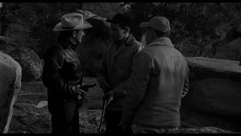 USA - 1958 - In this sci fi horror, men hold guns and search for someone. Men Stockbeeldmateriaal 323084173