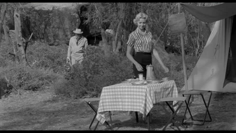 USA - 1958 - In this sci-fi horror, people camp in the woods. They drink coffee Video stock 323085506