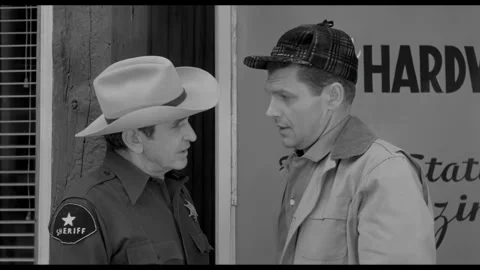 USA - 1958 - In this sci-fi horror, a man chides a sheriff. An archeologist in a Stock-Footage 323086337