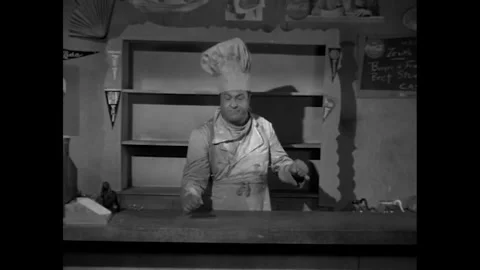 USA - 1959 - In this comedy horror, a duck flies by a chef in a diner. A man Stock Footage 341977245