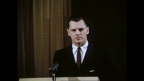 USA - 1959 - A man gives a presentation about IBM banking computers. A woman Stock Footage 328192522