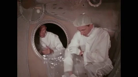 USA - 1960s - Lockheed Martin engineers clean and lubricate spacecraft Stock Footage 316408206