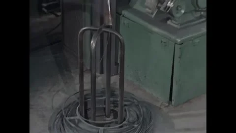 USA - 1960s - Wire is spun by machine at a factory. Stock Footage 340665449