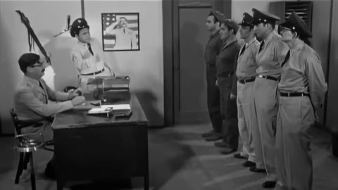 USA - 1962 - In this comedy, a US Army officer gathers men in a huddle to share Stock Footage 308176609