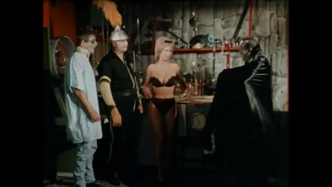 USA - 1964 - In this comedy horror, a vampire enters a laboratory and bites an Stock Footage 341982952