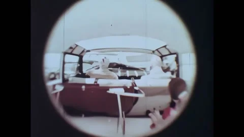 USA - 1964 - Different car crashes are examined. A baby crash test dummy in a Stock Footage 328182219
