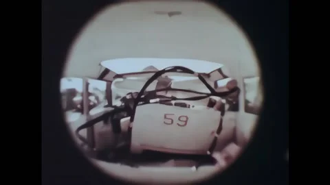 USA - 1964 - Different car crashes are examined. A crash test dummy comes out of Stock Footage 328188369