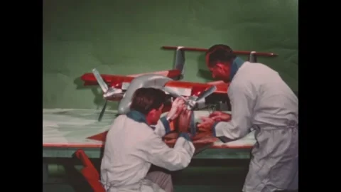 USA - 1964 - Engineers work on a scale model of an experimental aircraft which Stock Footage 340588100