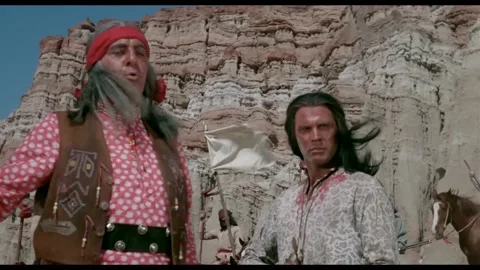 USA - 1964 - In this western, an Apache chief tells a US Cavalry captain (Audie Video stock 308177297