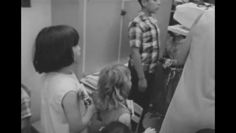 USA - 1965 - Children graduate from the Head Start preschool program. Stock Footage 340581953
